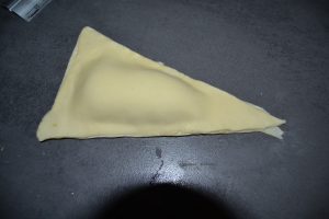 triangle de pâte déposer et souder 